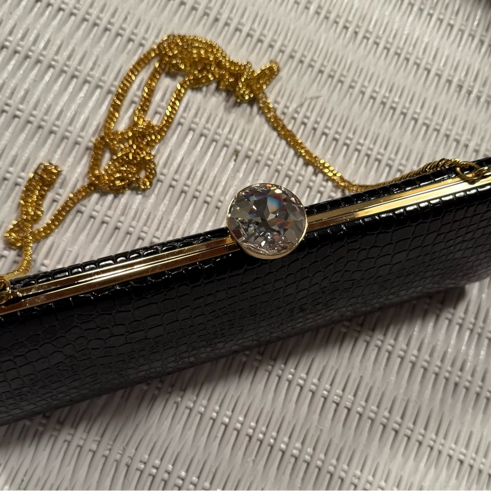 Elegant Black and Gold Clutch with Chain